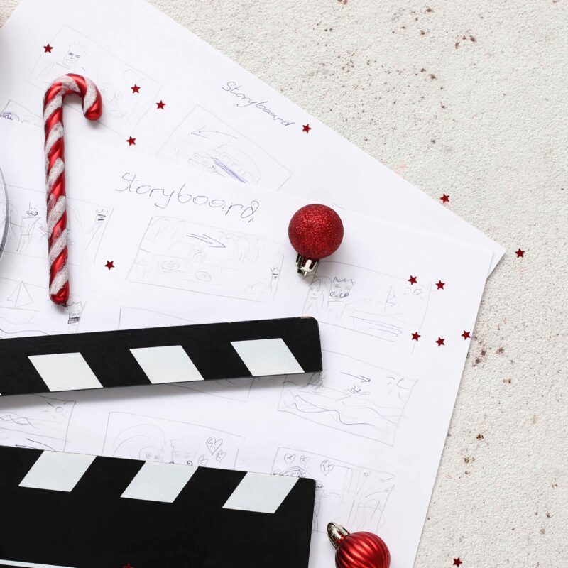 Image showing movie reel and holiday decor to represent year end recap reels