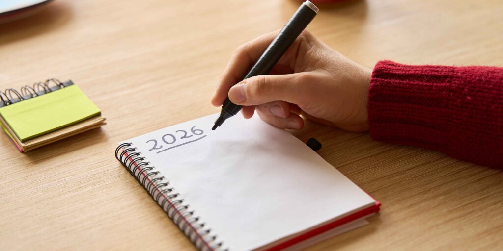 Image showing someone writing New Year's Resolutions